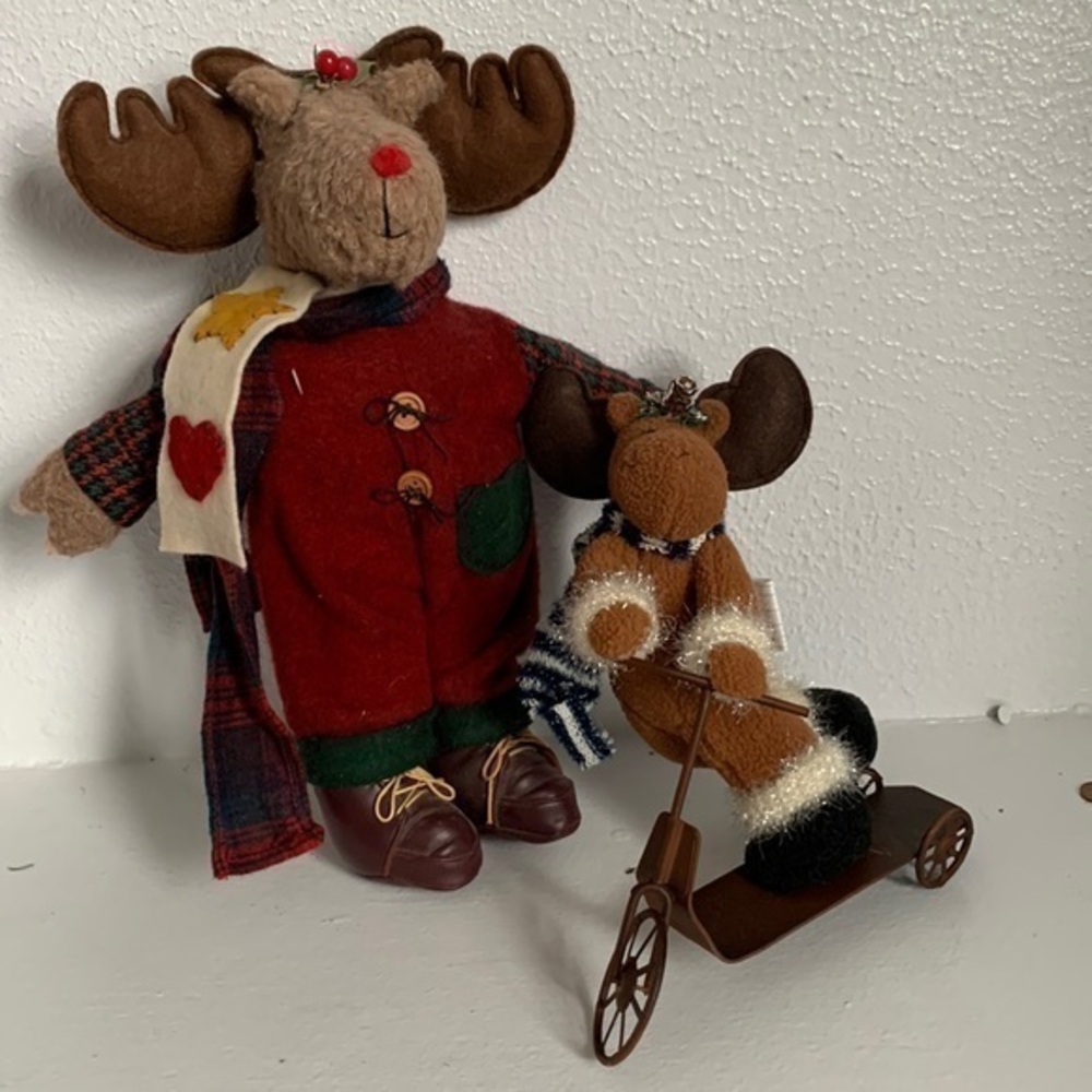 Two really cute and fun moose.